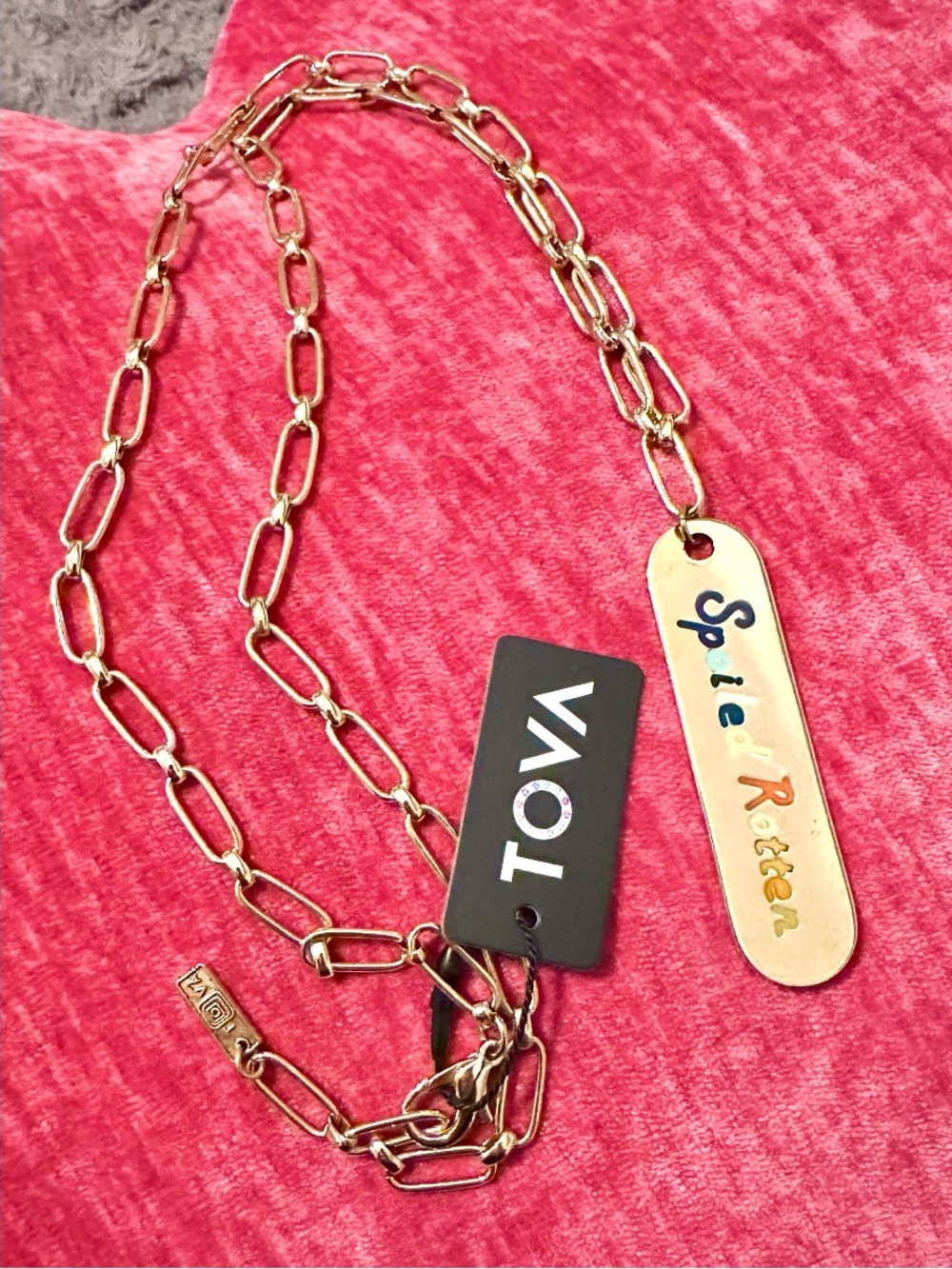 TOVA Long gold chain necklace featuring a "Spoiled Rotten" pendant, NWT